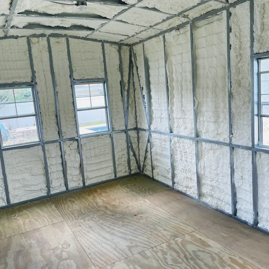 Closed-cell spray foam insulation applied to wall cavities in a residential project in Monahans